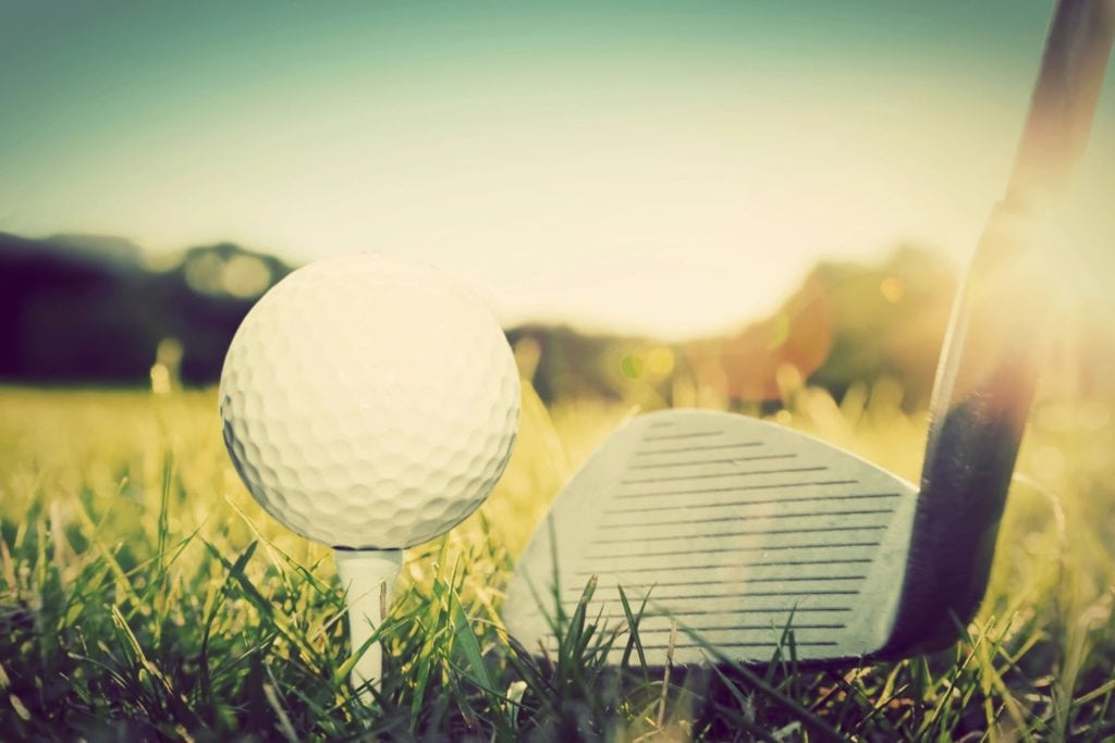 golf tee on grass